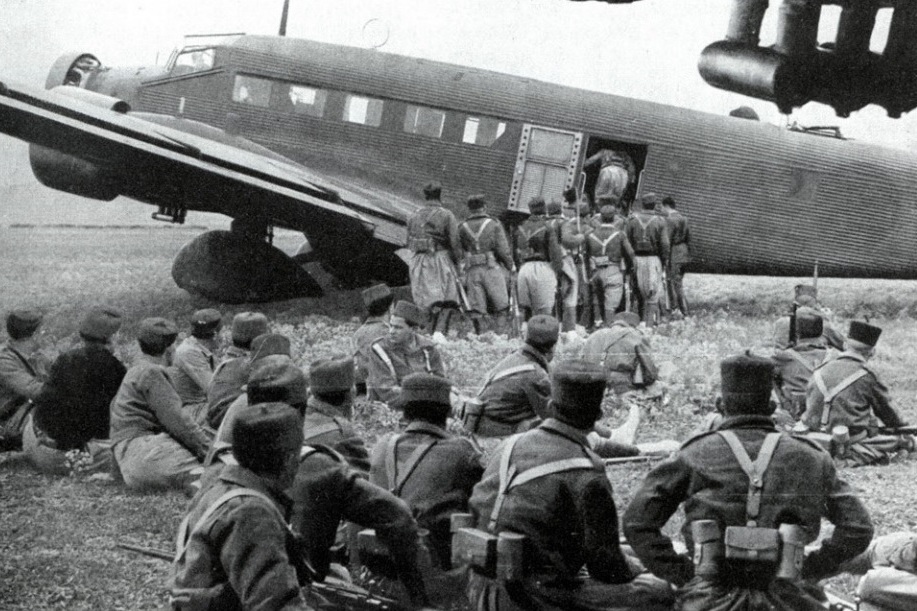 Moroccan troops boarding a Ju-52 Transport Plane 
